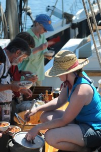 Amber dishes out  Italian Sausage Soup for lunch while sailing aboard the Lewis R. French, a Maine windjammer. Tom Nangle photo.