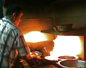 Abraham, who hails from Morocco, cooks up a firey storm in the kitchen at Fez. Hilary Nangle photo. 