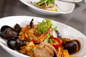 One of Chef Mitchell Kaldrovich's signature dishes at the Sea Glass Restaurant is Gulf of Maine seafood and lobster paella. 