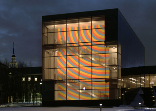 The three-story wall drawing on the stairway of the new Alfond-Lunder wing at Colby College Museum of Art by Sol LeWitt is illuminated at night. Colby College Museum of Art Courtesy of the Estate of Sol LeWitt