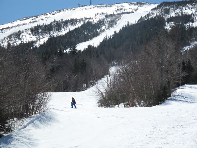 Skier ponders, hmmm, Sluice or Spillway?