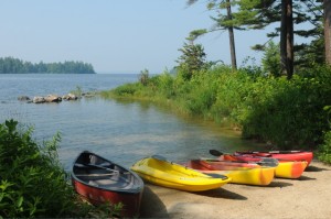 Paddle along Sebago's shoreline or out to an island from Migis Lodge. ©