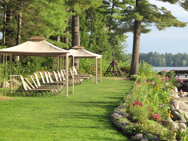 Relax while gazing over gardens to Sebago Lake. ©Hilary Nangle