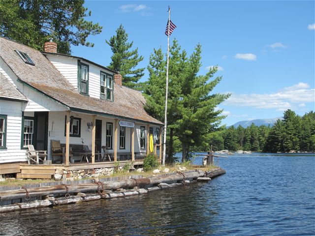 For a real immersion into Maine's logging heritage, plan a visit to the Ambejejus Boom House, a National Historic Landmark accessible only by water, in Maine. ©Hilary Nangle .