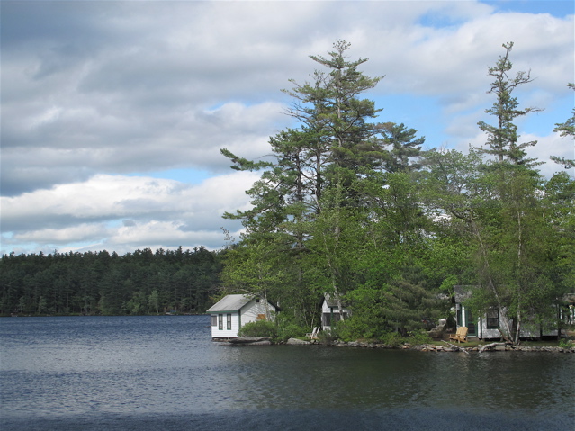 Some of the cabins at Castle Island Camps on Long Pond, in Belgrade Lakes, Maine, are built right over the water. Hilary Nangle photo.