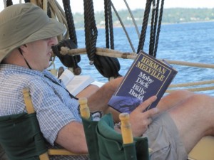 Some guests read, others simply relax or help with raising and lowering sails, when cruising aboard a Maine windjammer such as the schooner Mary Day. Sheila Grant photo. 