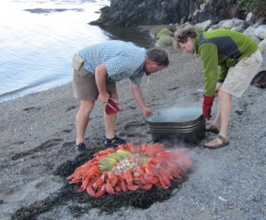 Sail by day, then pull into a remote cove for a lobster bake, when cruising aboard a Maine windjammer such as the schooner Mary Day. Sheila Grant photo. 