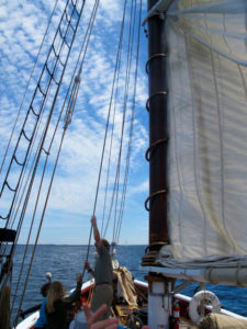Raising the sails aboard the J&E Riggin. @Hilary Nangle