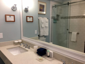 Guestroom amenities include bathrobes, wifi, bottled water. ©Hilary Nangle