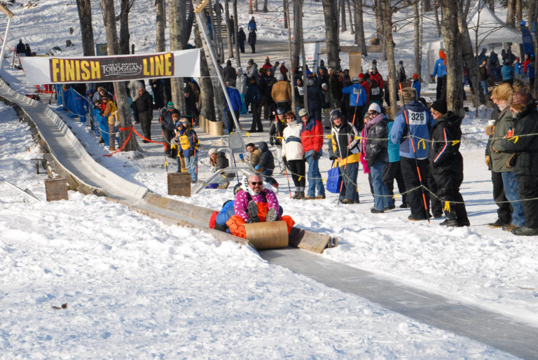 Participate in or watch the annual tobogganing championships at the Camden Snow Bowl.