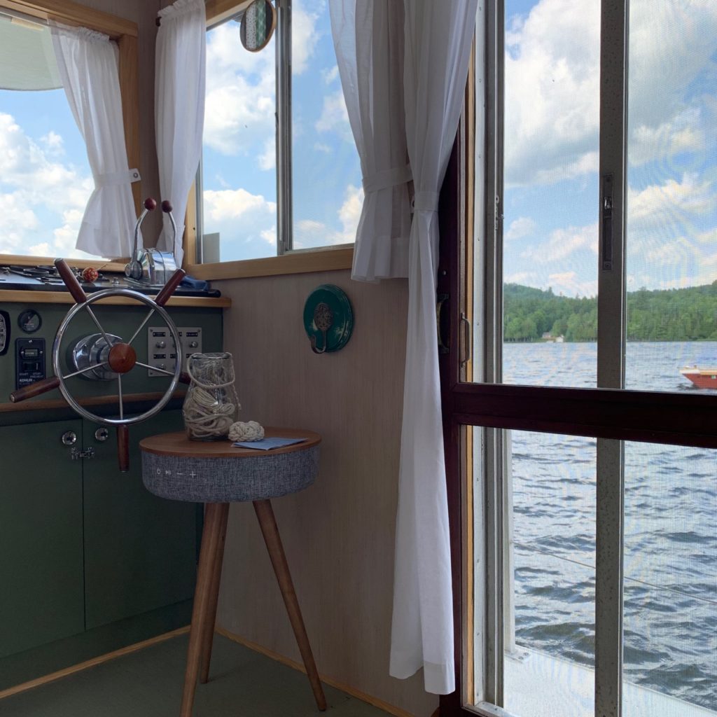 The captain's wheel and big windows and doors,