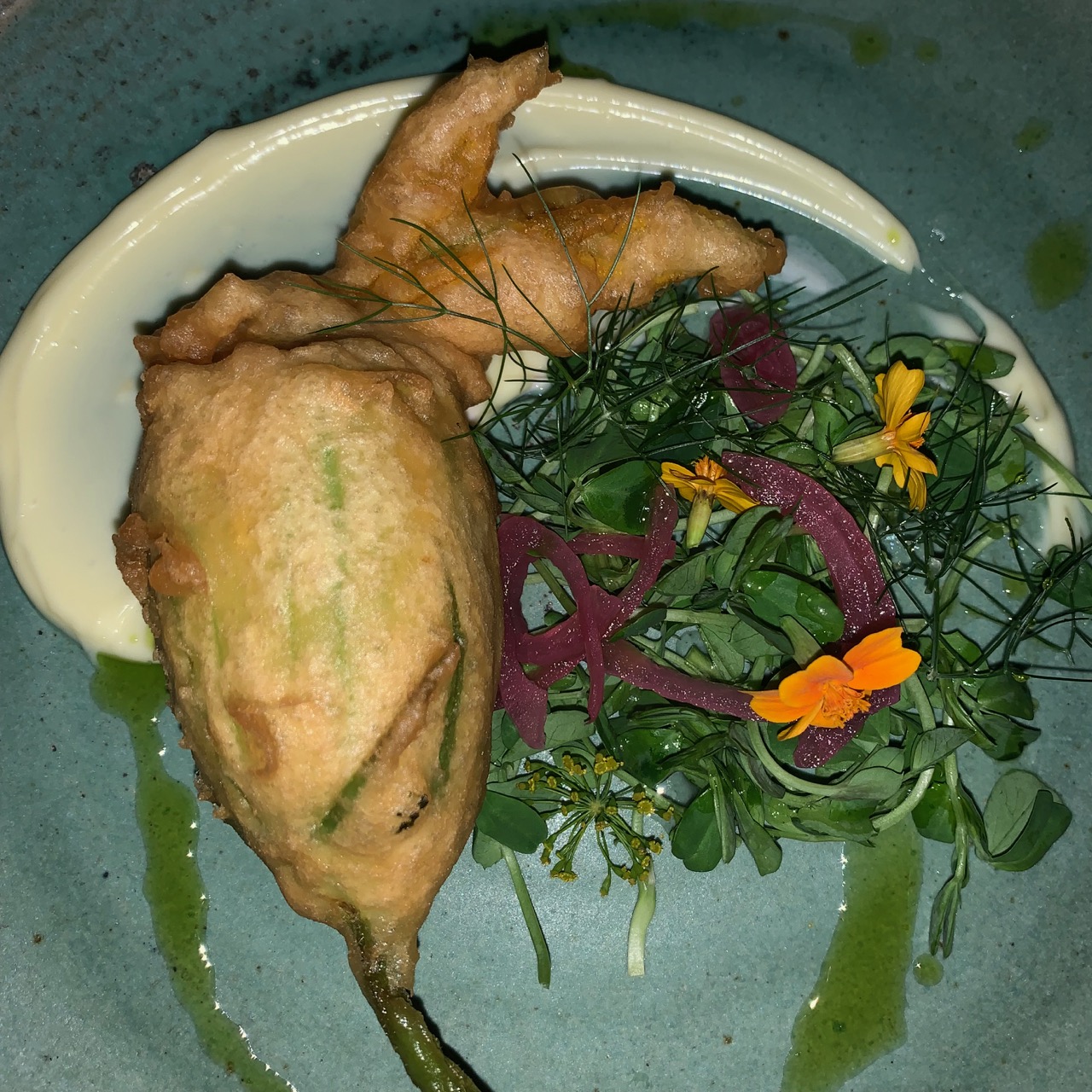 Aragosta's menu reflects what's fresh and local, like these squash blossoms.