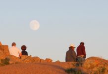 Make Acadia National Park Cadillac Summit Road to visit the highest point on the eastern seaoard, shown here during a late afternoon full moon.