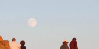 Make Acadia National Park Cadillac Summit Road to visit the highest point on the eastern seaoard, shown here during a late afternoon full moon.