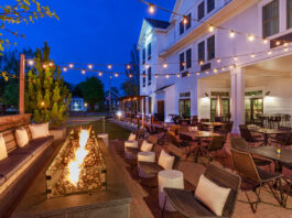 Outdoor patio with fireplace at Noble Kitchen & Bar. The Brunswick Hotel Review. courtesy photo