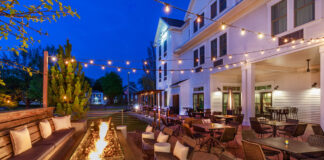 Outdoor patio with fireplace at Noble Kitchen & Bar. The Brunswick Hotel Review. courtesy photo